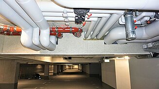 Installation Trinkwasser, Heizung, Abwasser, Lüftung in der Tiefgarage